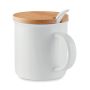 Taza de porcelana con cuchara